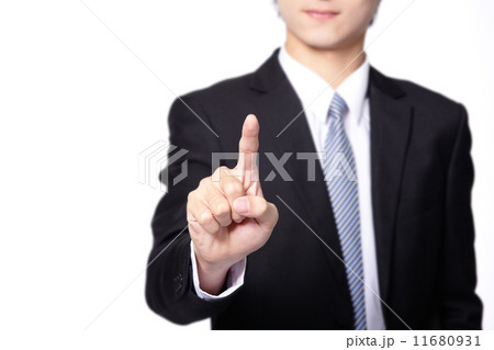 Business Man pushing on a touch screen interface Business Man pushing on a touch screen interface 11680931