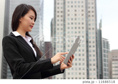 Lady with Business Outfit and Tablet 2 Lady with Business Outfit and Tablet 2 11686518