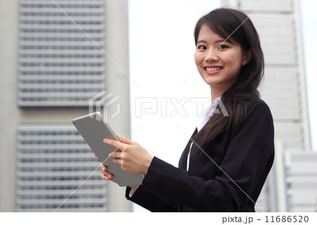 Lady with Business Outfit and Tablet 4 Lady with Business Outfit and Tablet 4 11686520