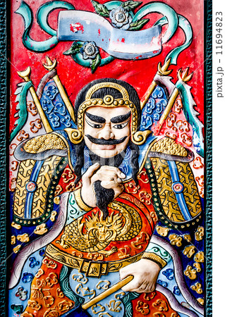 Carving wood of Chinese god on the door Carving wood of Chinese god on the door 11694823