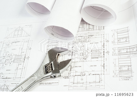 wrench and drawings, construction still life 11695623