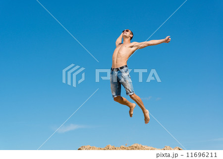 young man jumping young man jumping 11696211