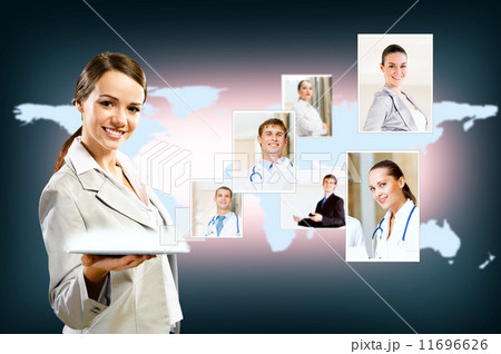attractive woman holding a tablet pc and smiling 11696626