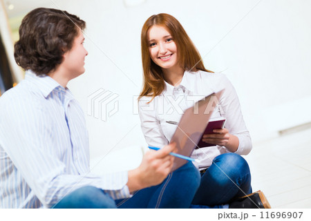 Attractive woman talking with a man 11696907