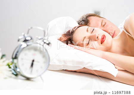 beautiful woman sleeping on the bed 11697388