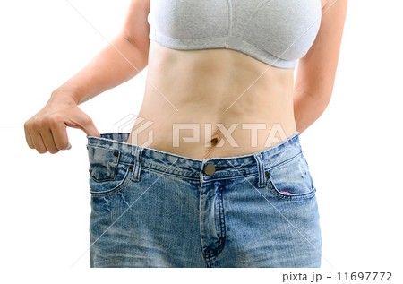 Big jeans on woman isolated Big jeans on woman isolated 11697772
