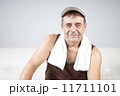 Adult Male Relaxes After Exercising. 11711101
