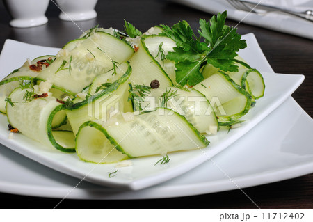 Salad from fresh cucumbers with garlic, dill, spices 11712402