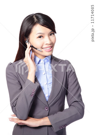 Female customer support operator with headset Female customer support operator with headset 11714085