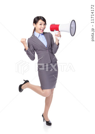 Business woman happy with a megaphone 11714172