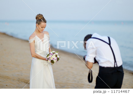 Bride posing for her groom 11714467