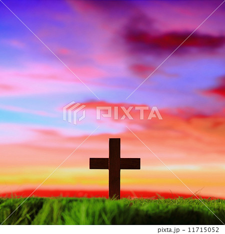 cross silhouette on grass with sunset background 11715052
