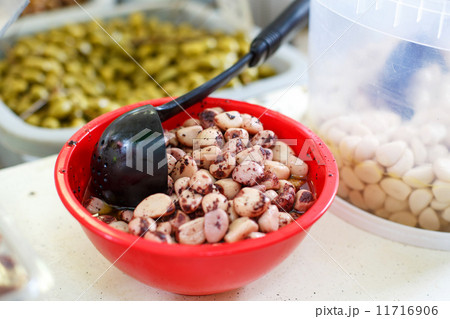 Marinated garlic and olives on provencal street market in Proven Marinated garlic and olives on provencal street market in Proven 11716906