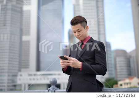 Businessman in city 11732363