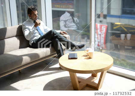 Businessman in office Businessman in office 11732532