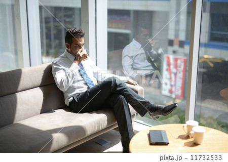 Businessman in office Businessman in office 11732533