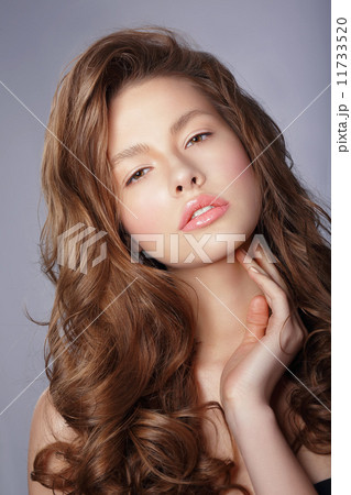Tenderness. Young Woman with Long Healthy Loosing Hair 11733520