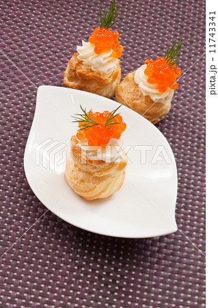 Puff pastry with cream cheese and caviar 11743341