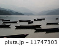 Boats on a Peaceful Lake 11747303