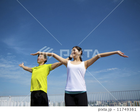 Young Asian Adults exercising Young Asian Adults exercising 11749361