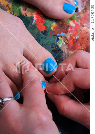 colored nails (pedicure) and color palette 11750439