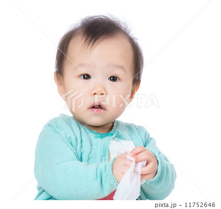 Asia baby girl play with tissue Asia baby girl play with tissue 11752646