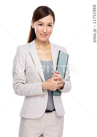 Businesswoman with clipboard Businesswoman with clipboard 11752968