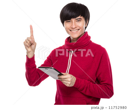 Young man with digital tablet and finger point up Young man with digital tablet and finger point up 11752980