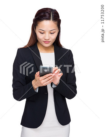 Business woman text on phone 11753200