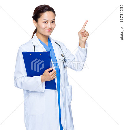 Female medical doctor with file pad and finger point out 11754259