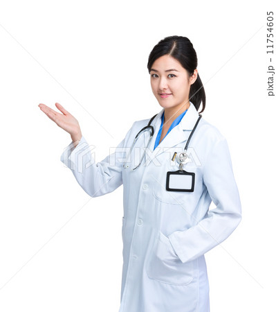 Woman doctor with hand presentation Woman doctor with hand presentation 11754605