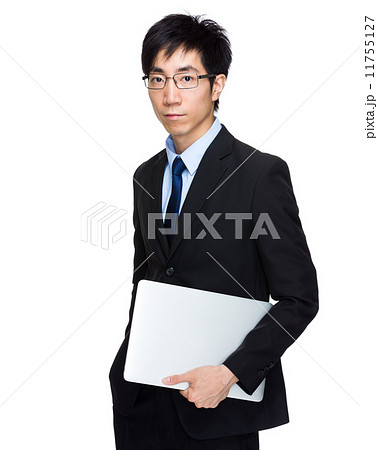 Businessman with laptop computer Businessman with laptop computer 11755127