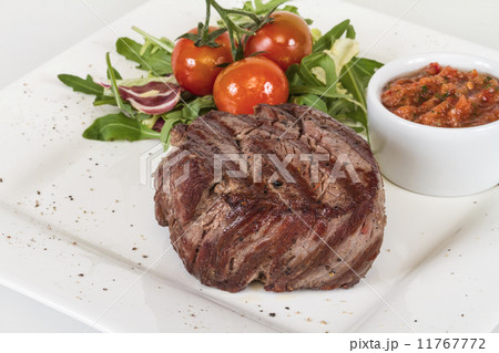Grilled Beef Steak Isolated On a White Background Grilled Beef Steak Isolated On a White Background 11767772