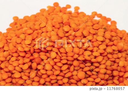 Heap of raw red lentils isolated on white background 11768057