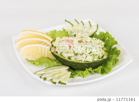 Crab meat salad with green caviar in avocado - japan cusine 11771161
