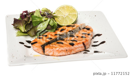 savory fish portion : roasted norwegian salmon fillet garnished 11772152