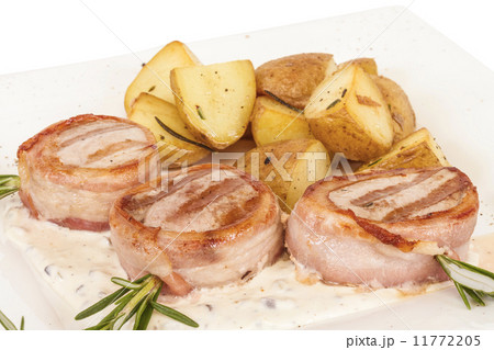 Grilled steak wrapped in bacon, with grilled vegetables, mashed Grilled steak wrapped in bacon, with grilled vegetables, mashed 11772205