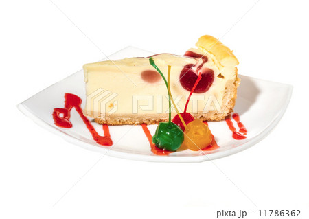 Closeup of a slice of cherry cheesecake on a white background Closeup of a slice of cherry cheesecake on a white background 11786362