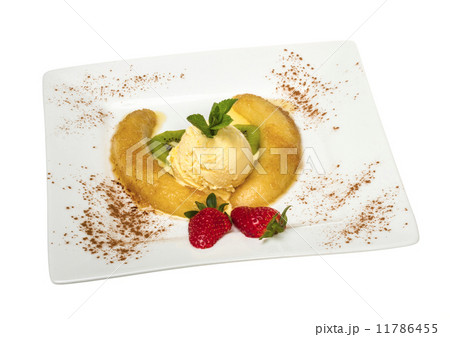 Dessert of banana, ice-cream, caramel, strawberry and mint Dessert of banana, ice-cream, caramel, strawberry and mint 11786455
