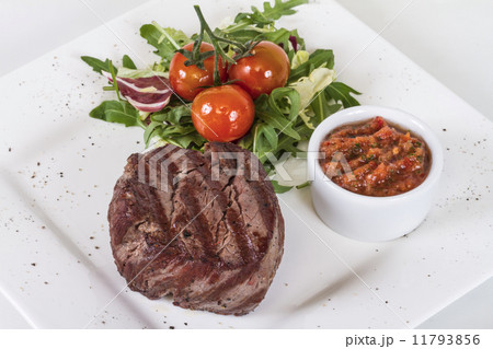 Grilled Beef Steak Isolated On a White Background Grilled Beef Steak Isolated On a White Background 11793856