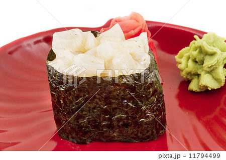 spice sushi hotate with sauced slices of scallop isolated on whi 11794499