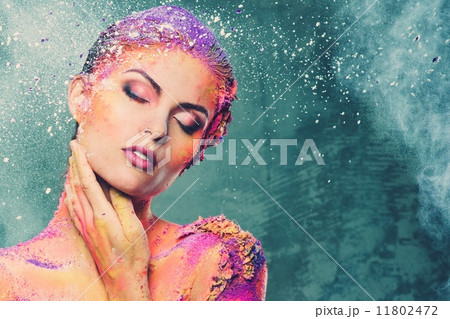 Beautiful young woman with conceptual colourful body art 11802472