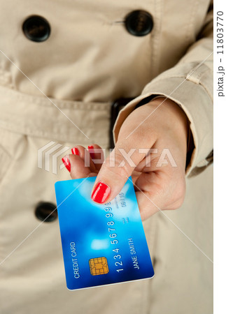 woman hand holding credit card woman hand holding credit card 11803770