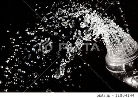Shower head with water on black. Shower head with water on black. 11804144