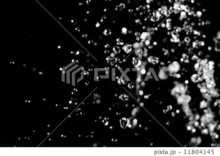 Water levitation with defocused lights on background Water levitation with defocused lights on background 11804145
