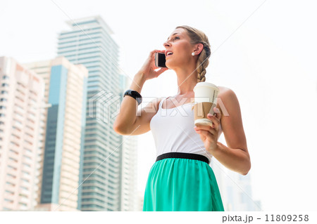 Woman working in metropolitan city Woman working in metropolitan city 11809258