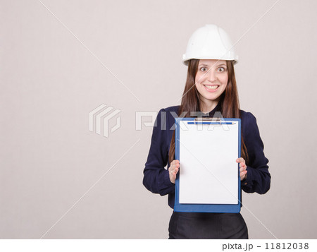 Girl a helmet in shock from inscription on sheet folder 11812038