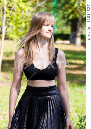 Blond woman in black 11814327