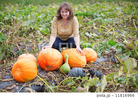 Young woman on the pumpkin patch 11816966