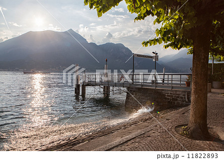 View of Como lake on sunset with pier in Italy 11822893